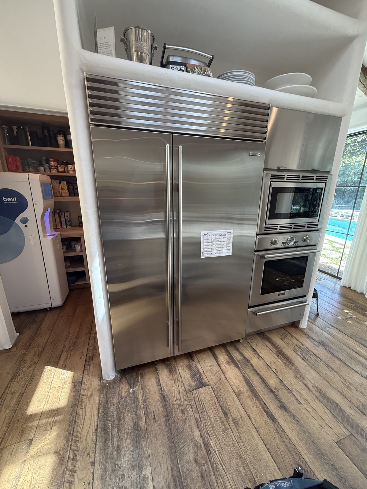 Built-in 48-inch Sub-Zero refrigerator and Thermador wall oven combination in a high-end Los Angeles kitchen serviced by A&Y Appliances