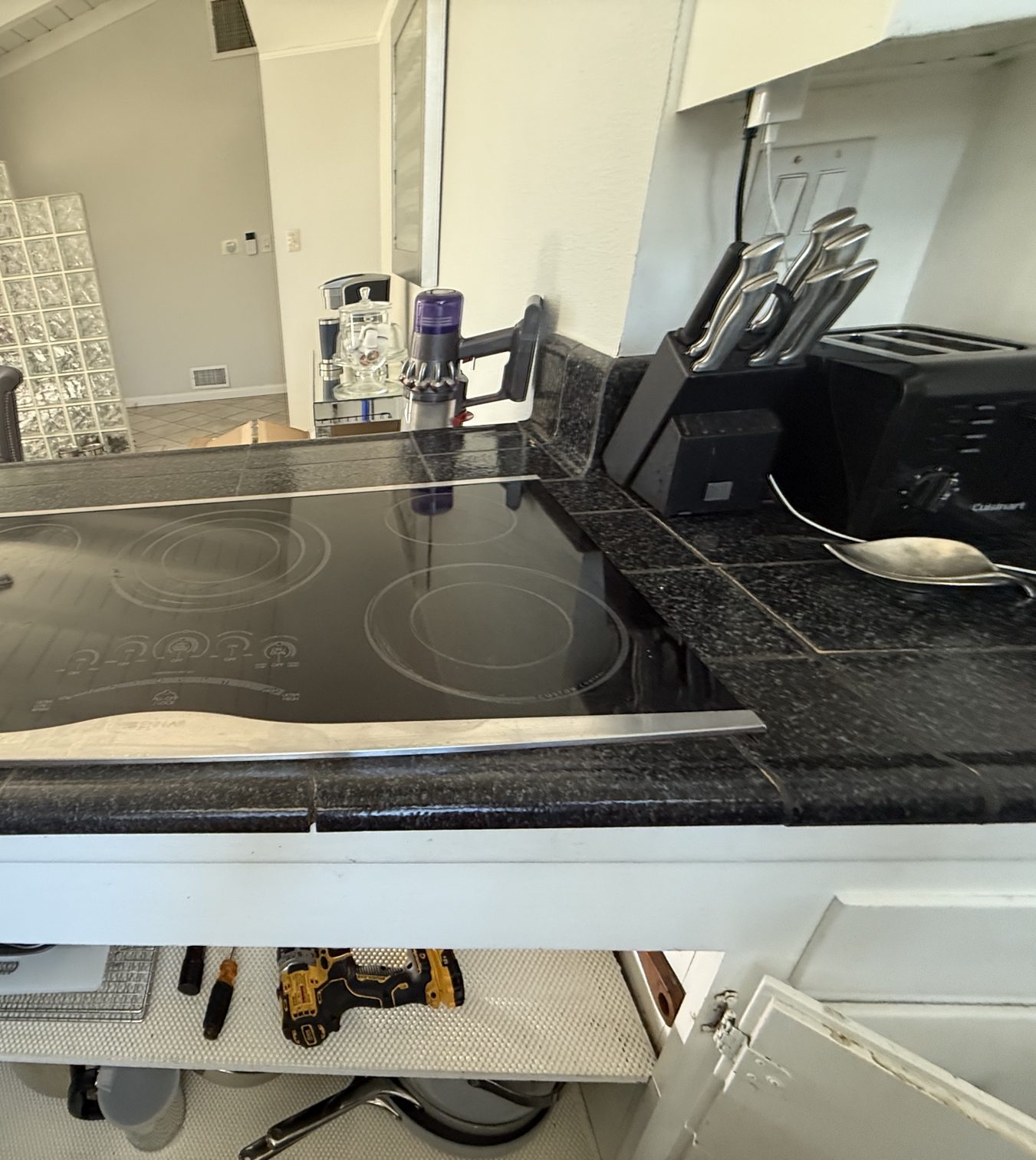 Wolf electric cooktop during installation and service by A&Y Appliances